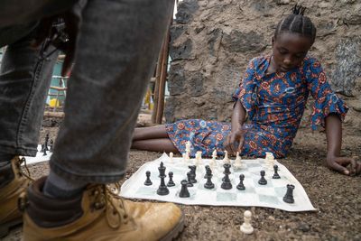 A chess club for kids thrives in a Congo refugee camp. It’s about more than the game