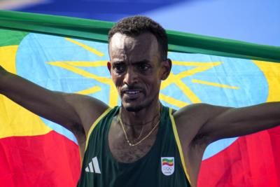 Tamirat Tola Wins Men's Marathon In Olympic-Record Time