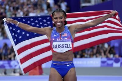 Masai Russell Wins Gold In 100M Hurdles By .01S