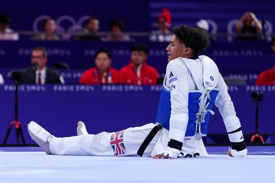 Caden Cunningham wins silver in taekwondo final