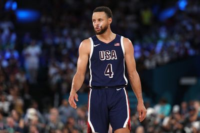 This photo of Steph Curry shooting over Victor Wembanyama is absolutely mesmerizing