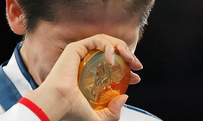 Boxer Lin Yu-ting sobs after winning Olympic gold amid gender row