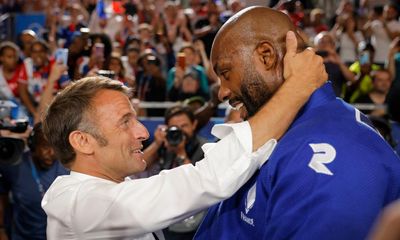 Macron is hugging France’s heroes as though he dare not let the Olympics go