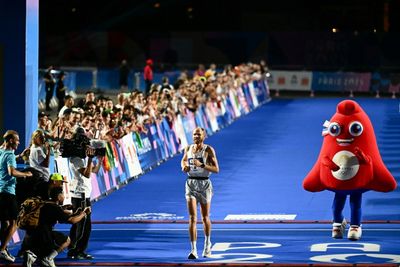 Sweat And Silly Hats At Paris 'Marathon For All'