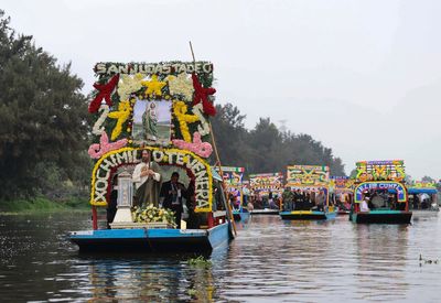 Catholic devotees honor St Jude's relic with watery procession through Mexico's Xochimilco canals