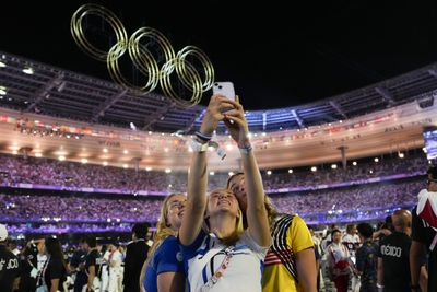 Curtain closes on Paris 2024 as Olympic flame passes to Los Angeles