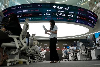 Asian shares are mixed, with Tokyo closed, as more tests for markets loom