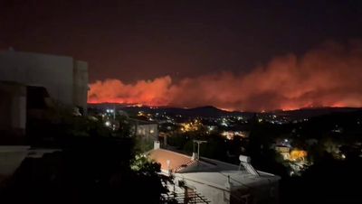 Greece: Wildfire rages out of control just outside Athens as temperatures in capital near 40C