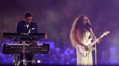 “Tom Cruise doing a crazy stunt while we’re jamming is ridiculous. What a legend”: H.E.R. performs the US national anthem on a gleaming custom Fender Strat – and solos as Tom Cruise abseils into the stadium – at the 2024 Olympics closing ceremony