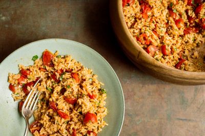 Fresh tomatoes and tomato paste impart deep flavor in this comforting Indian rice dish