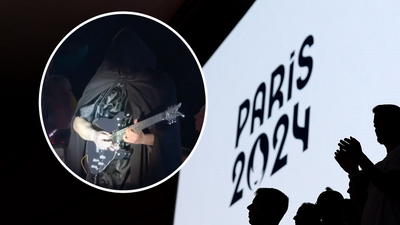 Who is the mysterious hooded guitarist who performed at the Paris Olympics closing ceremony?