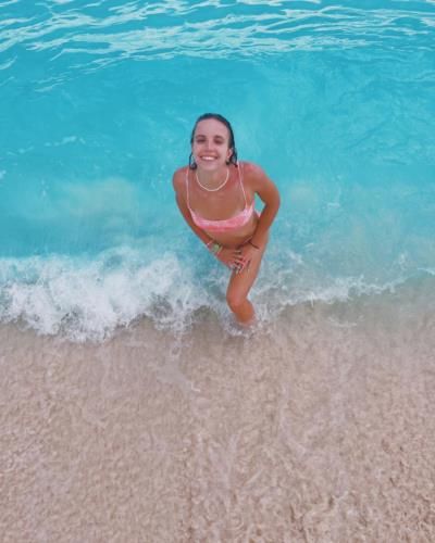 Regan Smith Enjoys Beach Day In Pink Floral Bikini