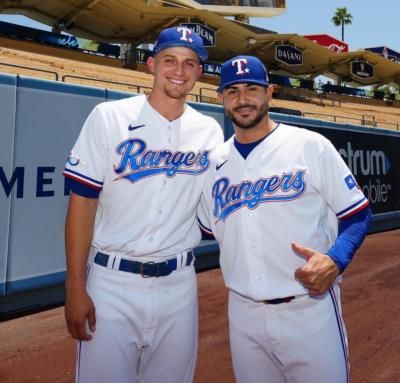 Celebrating Team Unity: Corey Seager And Baseball Teammates Strike Pose