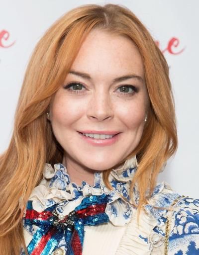 Lindsay Lohan Stuns In Lime Green Dress At Disney Event.