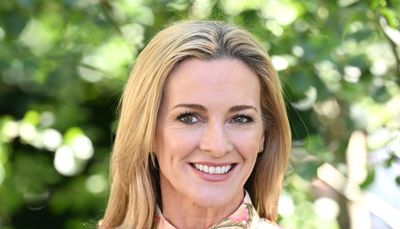 Gabby Logan's chic embroidered blouse and white tailored trousers is a winning combination that we can't wait to recreate