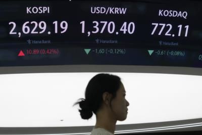 Asian Shares Mixed As Tokyo Rebounds From Last Week's Plunge