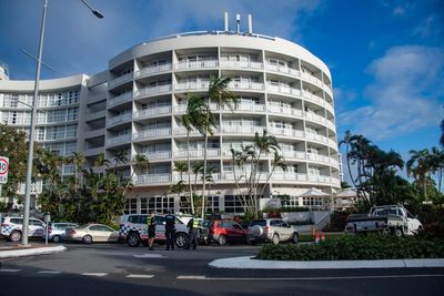 Man who died in helicopter crash on Cairns hotel roof had no previous flying experience in Australia