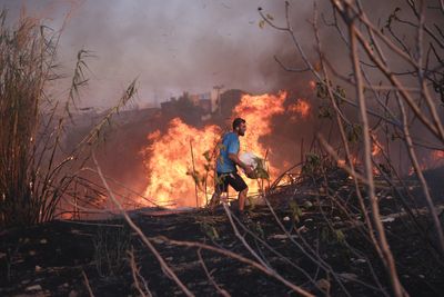 How serious are the wildfires near Athens, Greece?