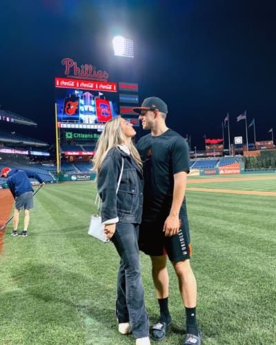 John Means And Wife Share Tender Moment On Field