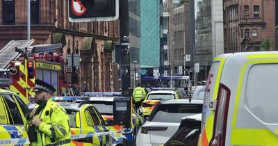 Police lock down busy street in major response as woman hit by car in city centre