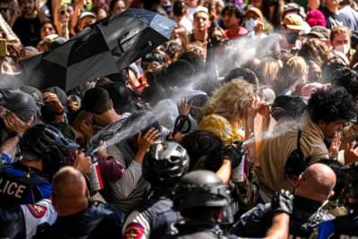 Protester Tackles Ferguson Officer, Causing Life-Threatening Brain Injury