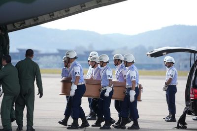 Brazil's air force flies the remains of 3 victims of last week's plane crash to their families