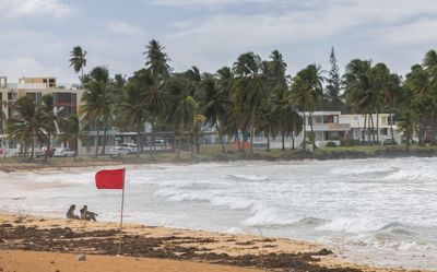 Tropical Storm Ernesto pummels northeast Caribbean and leaves hundreds of thousands in the dark