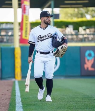 Ka'ai Tom Demonstrates Baseball Skills In Full Attire