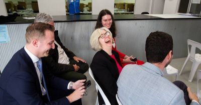 Candidates share a laugh at council election ballot draw