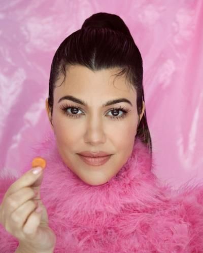 Kourtney Kardashian Stuns In Pink For Lemme Glow Photoshoot.