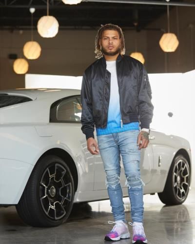 Tyrann Mathieu Exudes Confidence In Sleek White Car Photoshoot