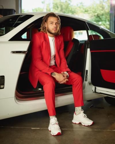 Tyrann Mathieu's Stylish Red Outfit Exudes Confidence And Elegance