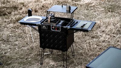 Can you believe this full camping kitchen has the packed size of a cooler box and costs under $500?