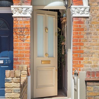 A peach colour palette has injected this scandi-style family home with warmth and character