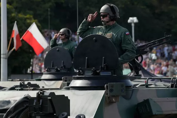 Poland showcases its growing army on a holiday that celebrates its historic defeat of the Red Army