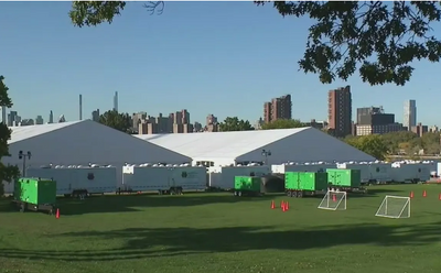 NYPD dismantles encampment of migrants evicted from Randall's Island shelter