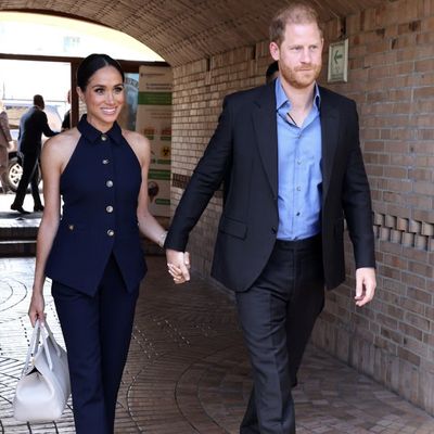 Meghan Markle Touches Down for Colombia Tour in the Tailored Vest Trend