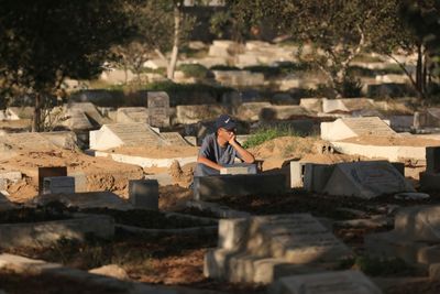 Gaza's Overwhelmed Undertakers Stack 'Graves On Top Of Graves'