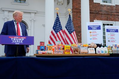 Bizarre moment Trump gets distracted by box of Cheerios during Bedminster press conference