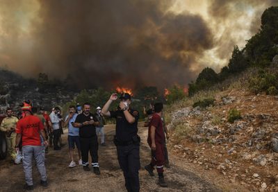 Thousands forced to evacuate as wildfires rage in western Turkey