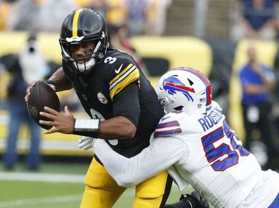 Russell Wilson takes a beating in brief Steelers debut