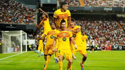 Robert Lewandowski's double strike earns Hansi Flick first win as Barcelona coach