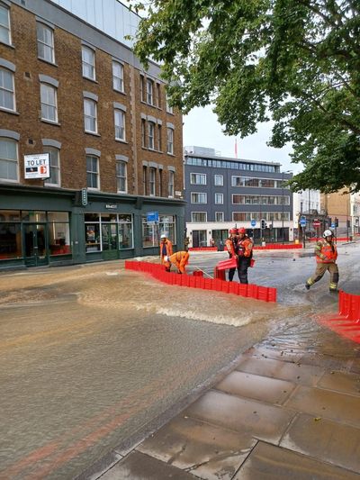 Dozens of firefighters tackle flooding in Kings Cross as hotel evacuated