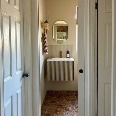 I'm a home stylist and this is how I made the most of my small shower room with some clever design tricks