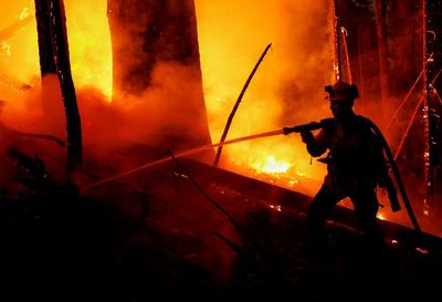 ‘Exceptionally difficult’: grueling wildfires test the resolve of US crews