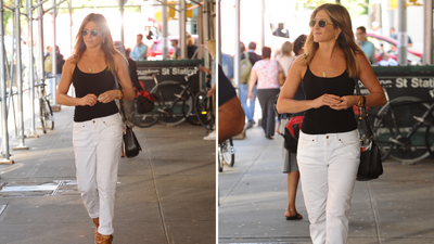 Jennifer Aniston's white jeans, simple black vest and timeless shoulder bag are proof that wardrobe basics can be so stylish