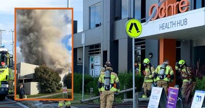 Possible roof collapse after north Canberra building catches fire