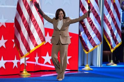 Kamala Harris makes surprise appearance on first night of DNC: ‘We are moving forward’