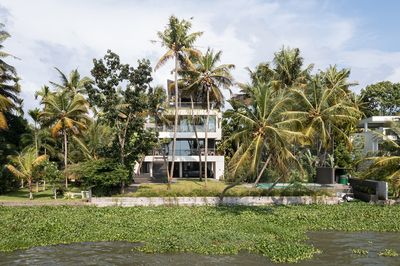 Peek behind the foliage at The Plumeria, a south Indian home by the water