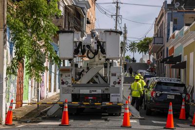 Tens of thousands remain without power in Puerto Rico, a week after tropical storm swiped the island